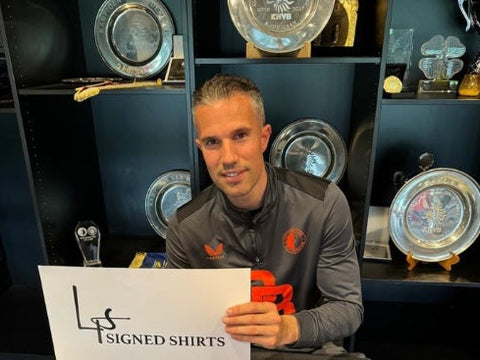 Signeersessie met Robin van Persie
